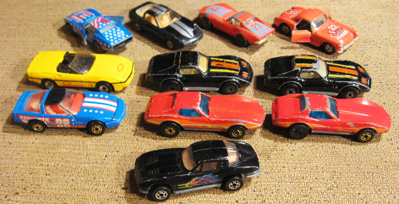Corvettes, The Playart Vette has a broken rear bumper, the top left one has no rear bumper piece, and the Road Champs lost an A Pillar.